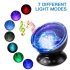 Qiilu LED Ocean Wave Night Light Projector With 7 Colors Light Show Projection Music Player Bedroom Living Room Decoration Night Light